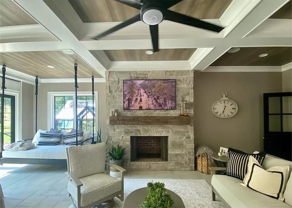 Natural stone ledgestone fireplace surround installation in Winter Garden, FL by Aesthetic Tile